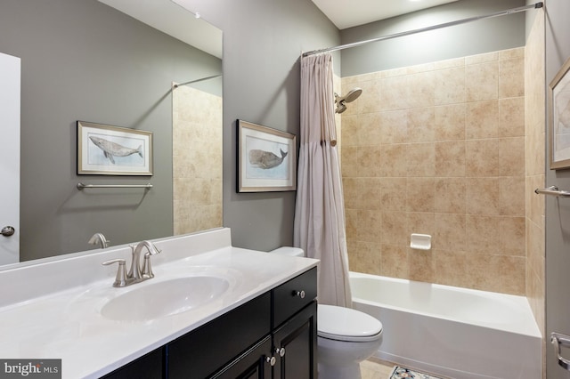 bathroom featuring toilet, shower / bath combination with curtain, and vanity