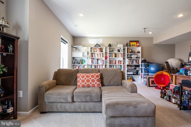 living area with carpet floors and recessed lighting