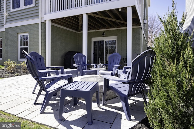 view of patio / terrace featuring a fire pit