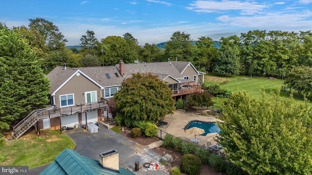 view from above of property with a pool area