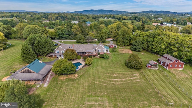 aerial overview of property's location with a mountainous background