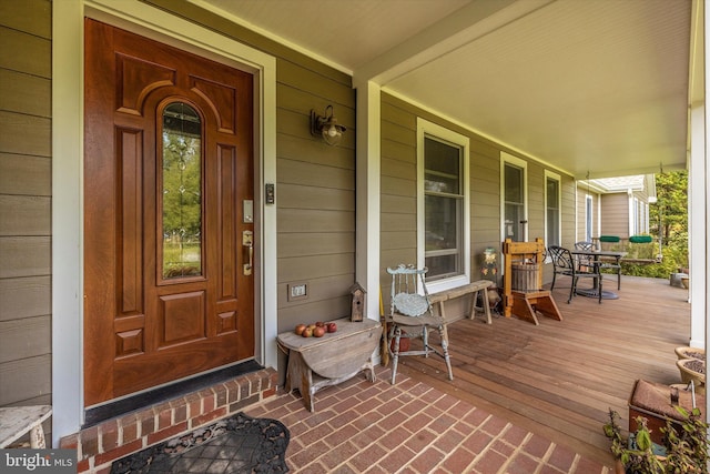 property entrance with a porch
