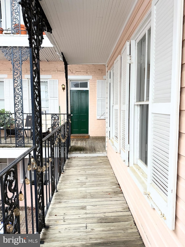 balcony featuring a porch