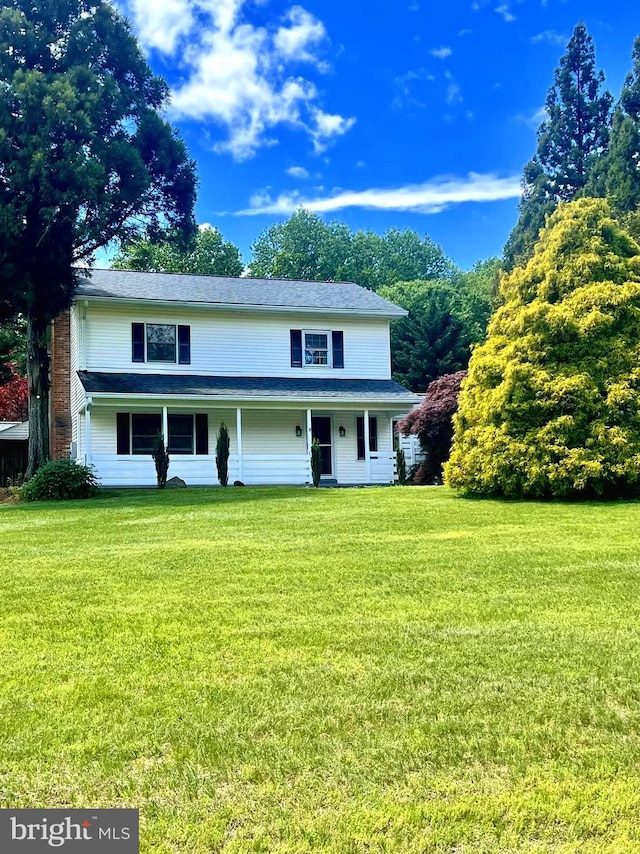 view of front of home with a front lawn