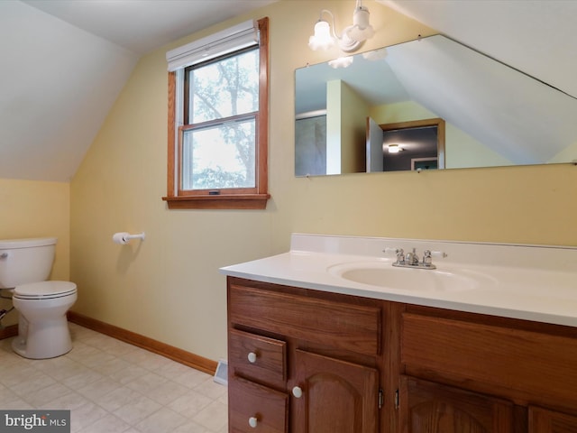14705 Bourbon St SW, Cresaptown, MD 21502 - bathroom featuring vaulted ceiling, toilet, vanity, and baseboards