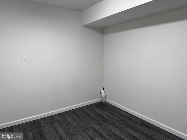 51 Healey Ct, Bunker Hill, WV 25413 - laundry area with dark wood-style flooring and baseboards