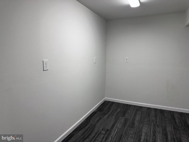51 Healey Ct, Bunker Hill, WV 25413 - spare room featuring dark wood-type flooring and baseboards