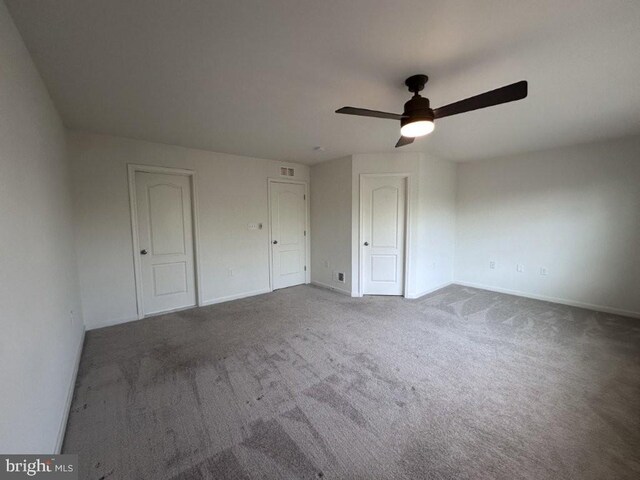 51 Healey Ct, Bunker Hill, WV 25413 - unfurnished bedroom featuring carpet floors, baseboards, and ceiling fan