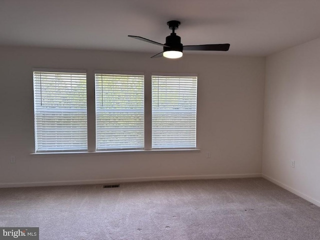 51 Healey Ct, Bunker Hill, WV 25413 - empty room with baseboards, ceiling fan, carpet, and plenty of natural light