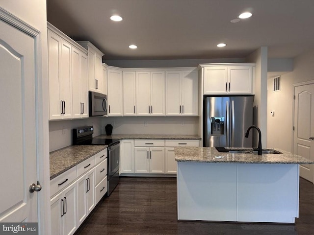 51 Healey Ct, Bunker Hill, WV 25413 - kitchen with appliances with stainless steel finishes, a sink, recessed lighting, white cabinets, and stone countertops