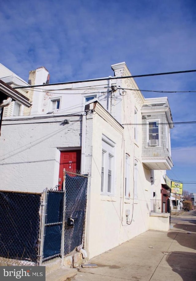 1000 N 43rd St, Philadelphia, PA 19104 - view of property exterior featuring fence and stucco siding