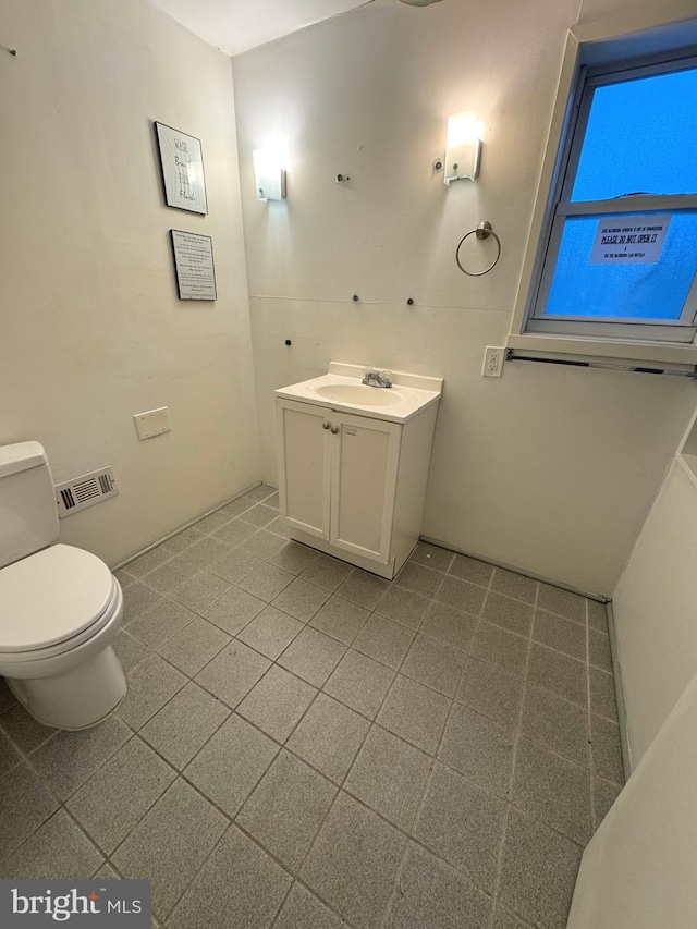 918 Ramsay St, Baltimore, MD 21223 - bathroom featuring vanity and tile patterned floors