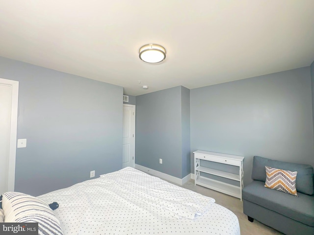 11631 Dorothy Sayers Pl, White Plains, MD 20695 - bedroom featuring light colored carpet and baseboards