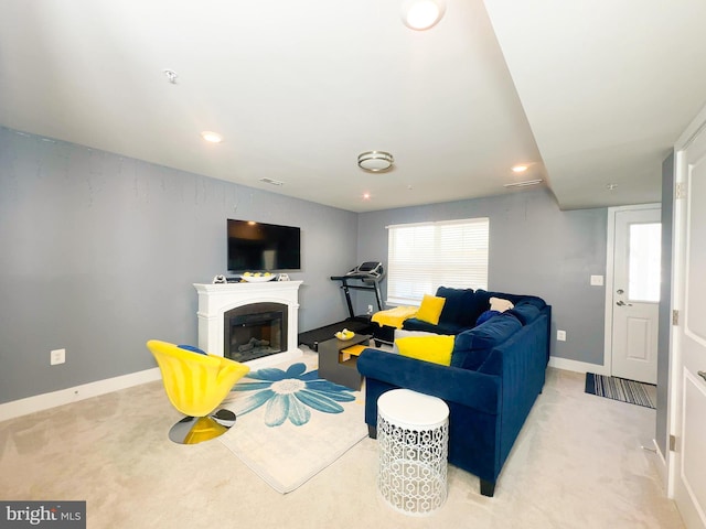 11631 Dorothy Sayers Pl, White Plains, MD 20695 - living room featuring carpet, baseboards, a fireplace, and recessed lighting