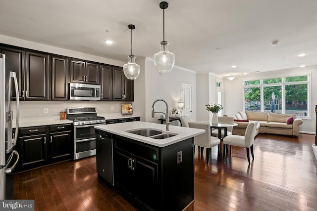 1102 Ribbon Limestone Ter SE, Leesburg, VA 20175 - kitchen with appliances with stainless steel finishes, a sink, dark wood-style flooring, light countertops, and crown molding