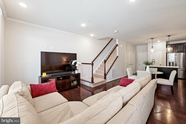 1102 Ribbon Limestone Ter SE, Leesburg, VA 20175 - living room with stairway, dark wood finished floors, ornamental molding, and recessed lighting