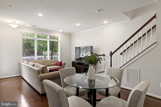 1102 Ribbon Limestone Ter SE, Leesburg, VA 20175 - dining room with crown molding, dark wood-style flooring, baseboards, recessed lighting, and stairway