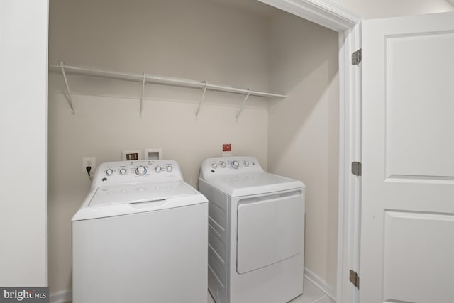 1102 Ribbon Limestone Ter SE, Leesburg, VA 20175 - laundry area featuring washing machine and dryer and baseboards