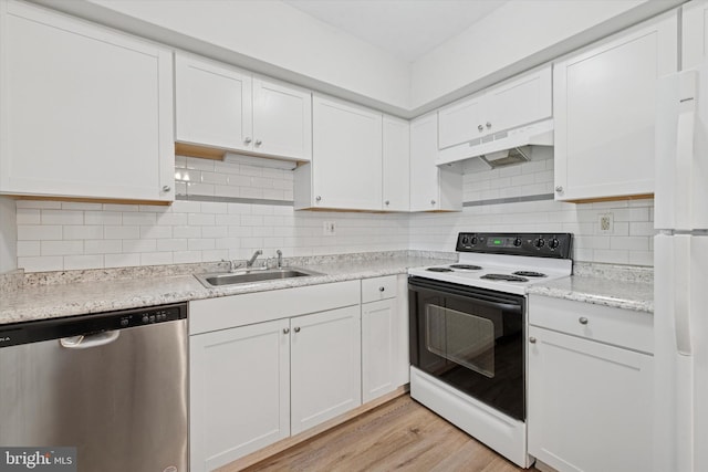 kitchen featuring stainless steel dishwasher, electric range oven, under cabinet range hood, white cabinetry, and a sink