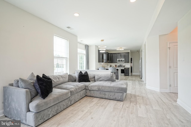 1094 Chews Landing Rd, Laurel Springs, NJ 08021 - living area featuring light wood-type flooring, baseboards, and recessed lighting