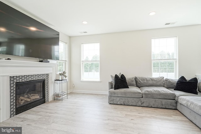 1094 Chews Landing Rd, Laurel Springs, NJ 08021 - living area with wood finished floors, recessed lighting, a glass covered fireplace, and baseboards