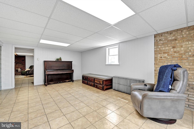 913 Pine Grove Rd, Fredericksburg, PA 17026 - sitting room featuring a paneled ceiling, radiator heating unit, and light tile patterned flooring