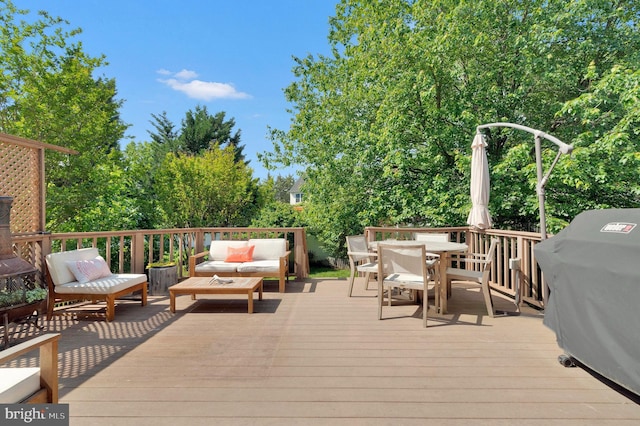 43257 Katie Leigh Ct, Ashburn, VA 20147 - wooden terrace with a grill, outdoor dining space, and an outdoor living space