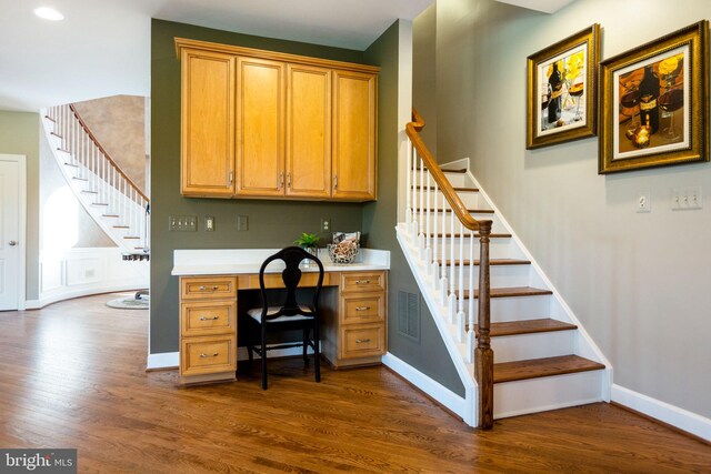 20550 Wildbrook Ct, Ashburn, VA 20147 - office area with built in study area, dark wood-style floors, and baseboards