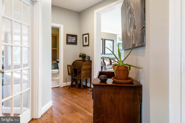 20550 Wildbrook Ct, Ashburn, VA 20147 - hall featuring light wood-style floors and baseboards