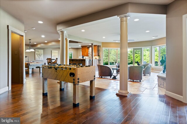 20550 Wildbrook Ct, Ashburn, VA 20147 - rec room with ornate columns, baseboards, recessed lighting, and dark wood-style floors