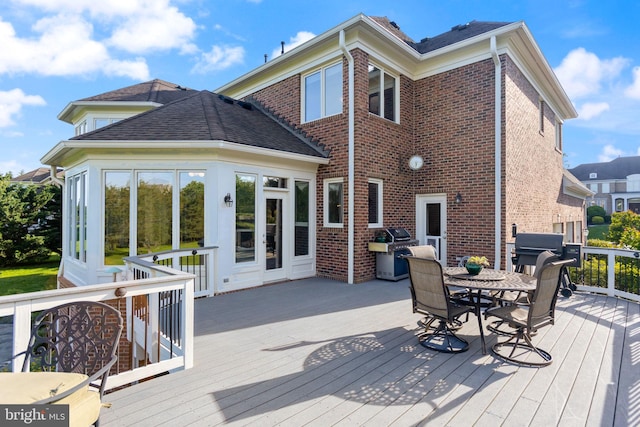 20550 Wildbrook Ct, Ashburn, VA 20147 - wooden deck featuring a grill and outdoor dining space