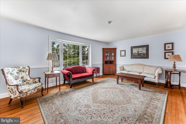 1795 Hillcrest Ln, Aston, PA 19014 - living area featuring wood finished floors and ornamental molding