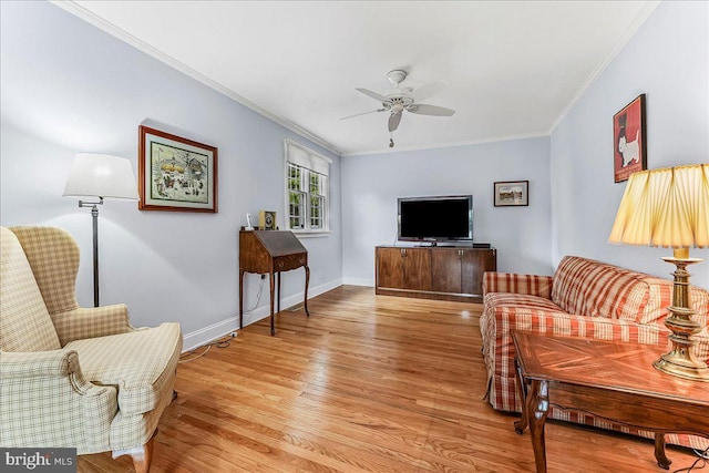 1795 Hillcrest Ln, Aston, PA 19014 - living room with ceiling fan, crown molding, light wood finished floors, and baseboards