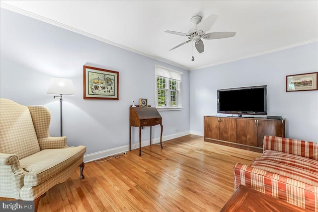 1795 Hillcrest Ln, Aston, PA 19014 - living area featuring crown molding, light wood-type flooring, baseboards, and ceiling fan