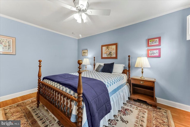 1795 Hillcrest Ln, Aston, PA 19014 - bedroom with baseboards, wood finished floors, crown molding, and ceiling fan