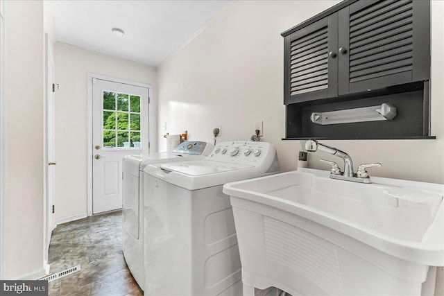 1795 Hillcrest Ln, Aston, PA 19014 - washroom featuring separate washer and dryer, cabinet space, and baseboards