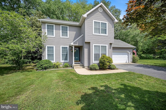 5 Governor Watson Ct, Milford, DE 19963 - view of front facade with driveway, a front lawn, and an attached garage