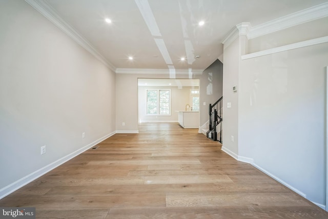 5561 Jowett Ct, Alexandria, VA 22315 - unfurnished living room featuring stairway, light wood finished floors, recessed lighting, and crown molding