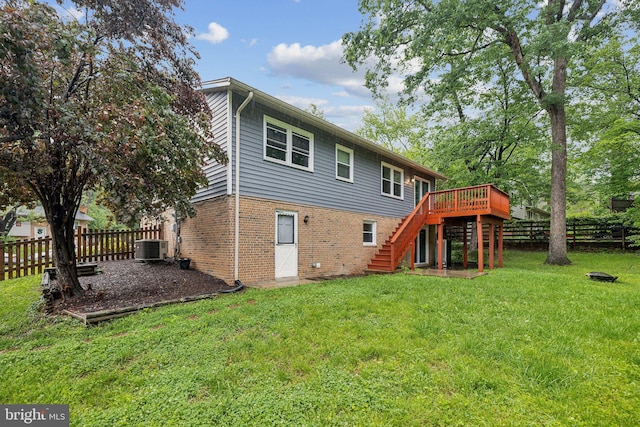 12991 Orleans St, Woodbridge, VA 22192 - rear view of house featuring stairway, brick siding, a deck, and central air condition unit