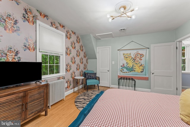 119 Burke, Towson, MD 21286 - bedroom with radiator, light wood-style floors, attic access, baseboards, and multiple windows