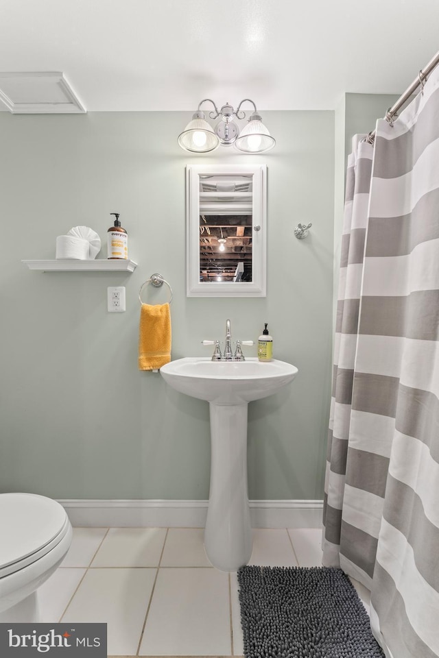119 Burke, Towson, MD 21286 - full bathroom with tile patterned floors, toilet, baseboards, and a shower with shower curtain