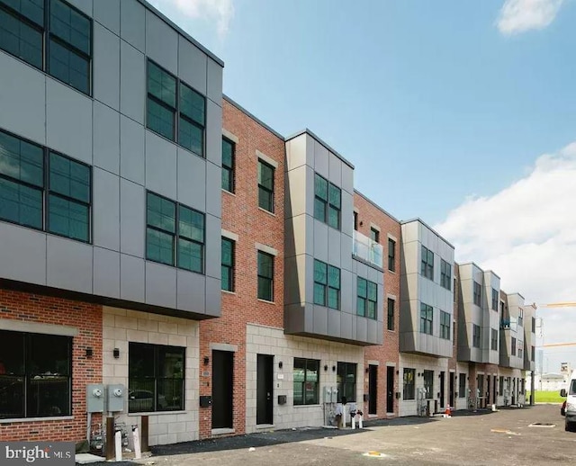 view of property with a residential view
