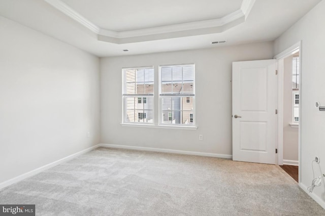 114 Commerce Center Dr, Sicklerville, NJ 08081 - empty room featuring a raised ceiling, ornamental molding, carpet flooring, and baseboards