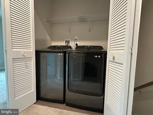 laundry room featuring independent washer and dryer