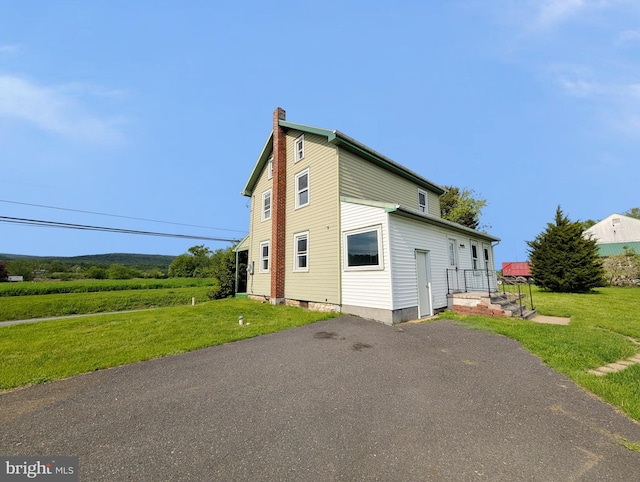 5809 Old Rte 22, Bernville, PA 19506 - view of property exterior featuring a chimney and a lawn