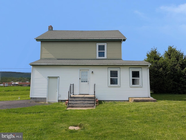 5809 Old Rte 22, Bernville, PA 19506 - rear view of house with a lawn and a chimney