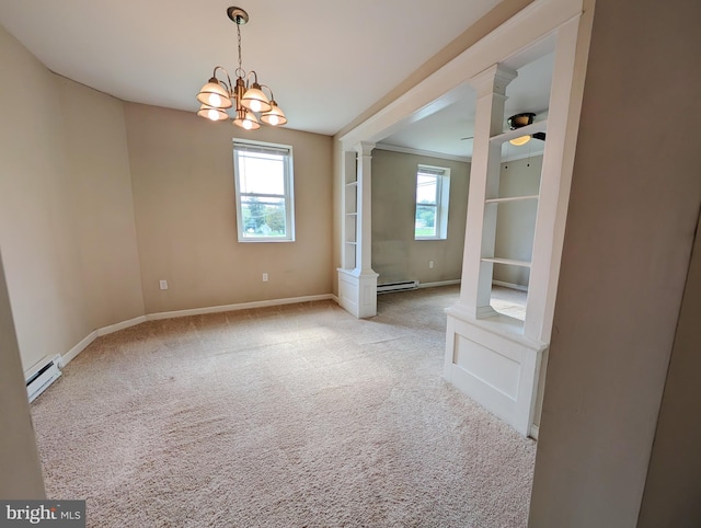 5809 Old Rte 22, Bernville, PA 19506 - carpeted spare room featuring a baseboard heating unit, decorative columns, baseboards, and a chandelier