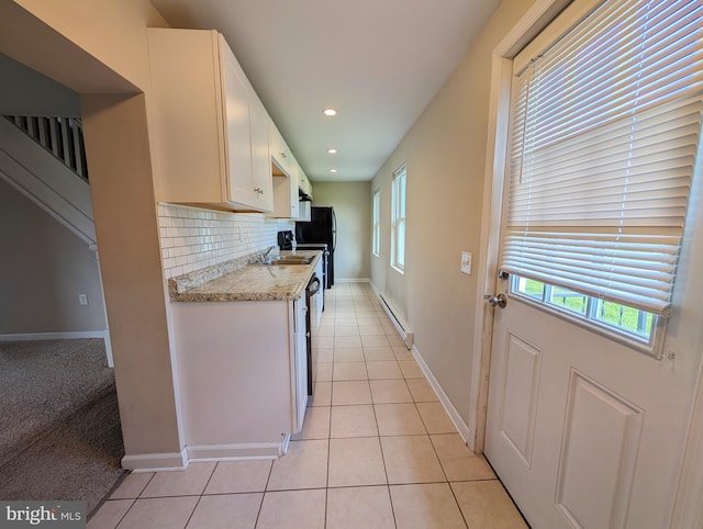 5809 Old Rte 22, Bernville, PA 19506 - kitchen featuring a baseboard heating unit, tasteful backsplash, light tile patterned flooring, recessed lighting, and white cabinets
