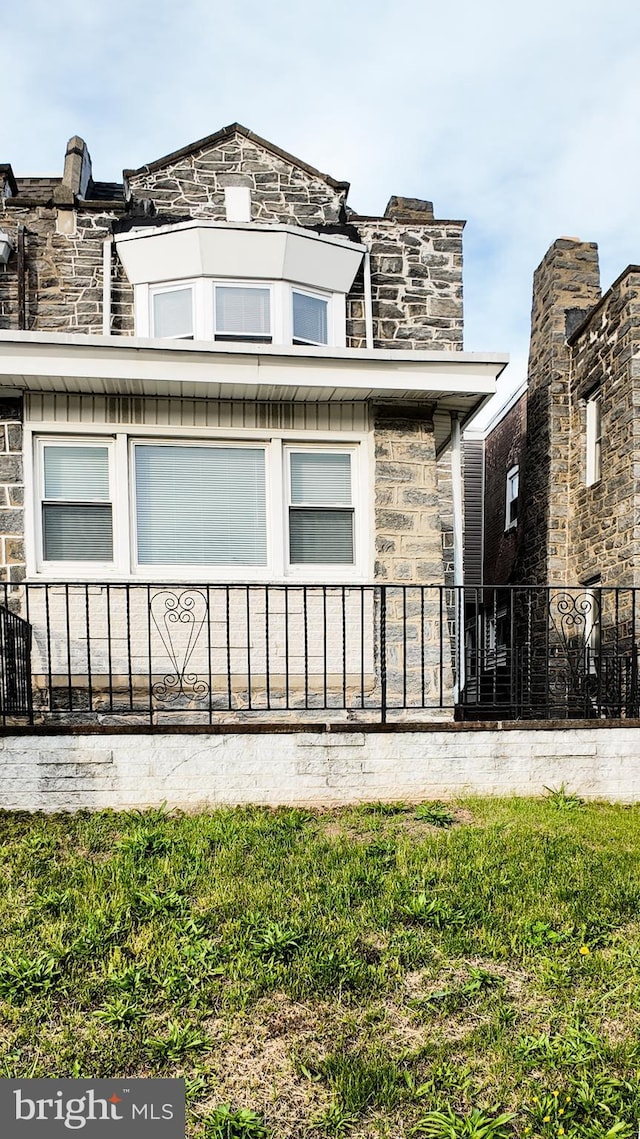 view of home's exterior featuring stone siding