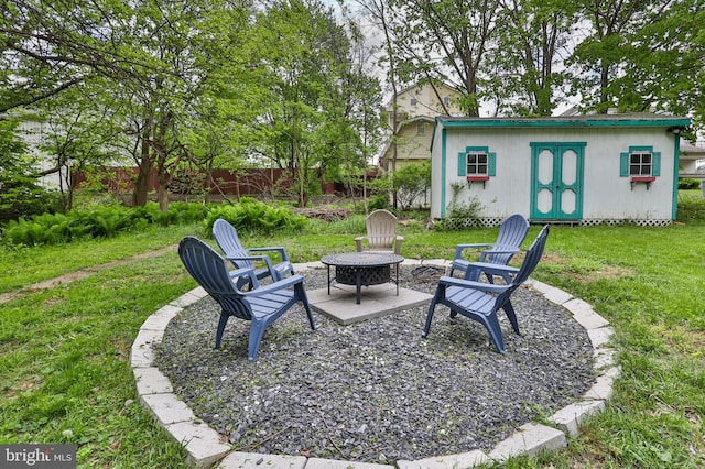view of yard with an outbuilding and a patio area